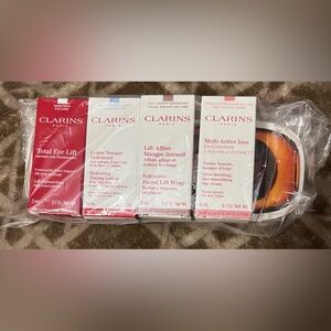 Clarins Travel Size Skincare Bundle - new/unopened